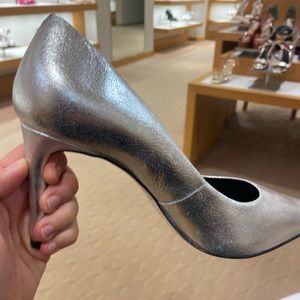 High heeled silver shoes
